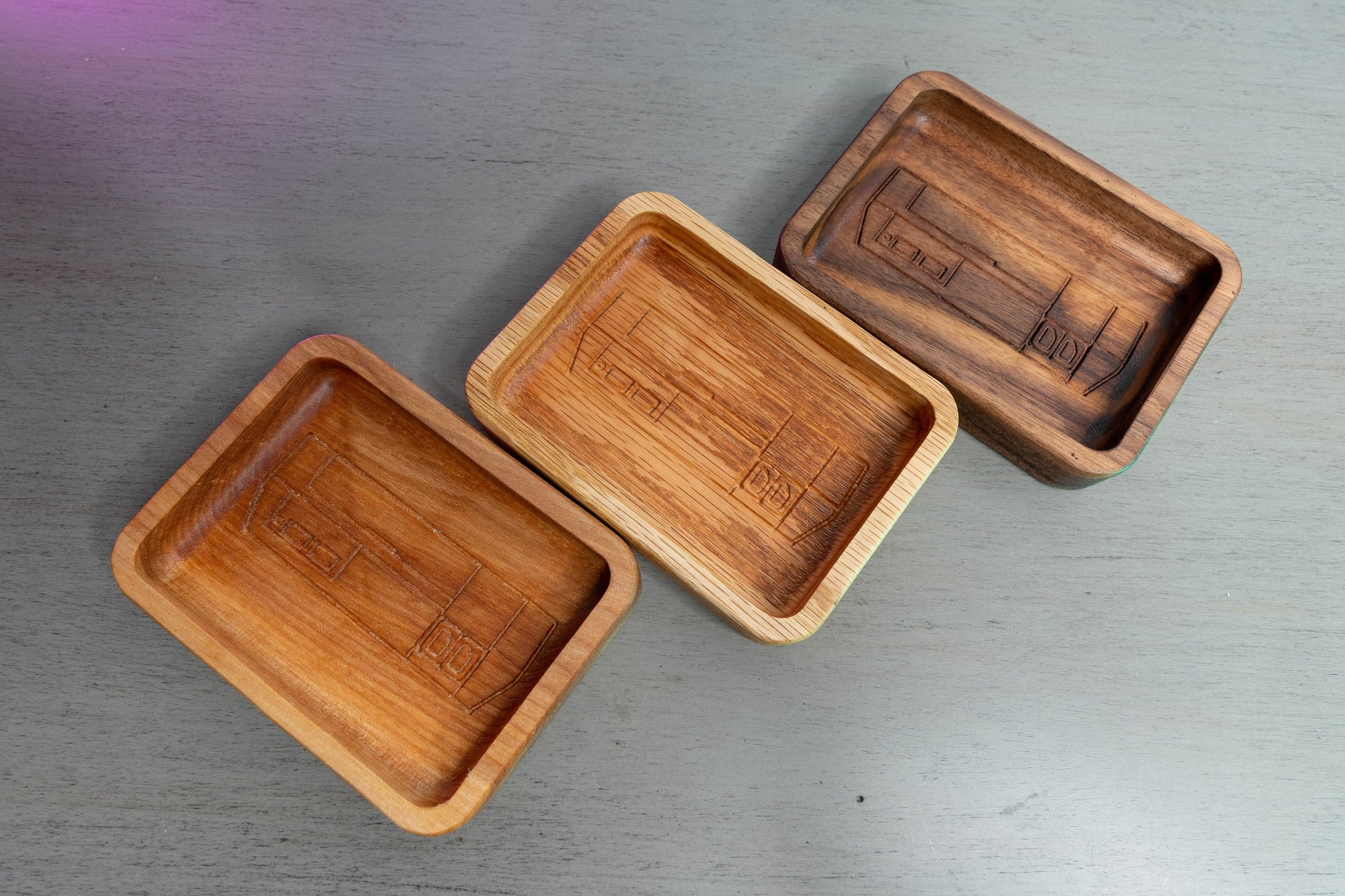 All three variants of Ring Dish, Birch on the left, Oak in the middle, and Walnut on the right